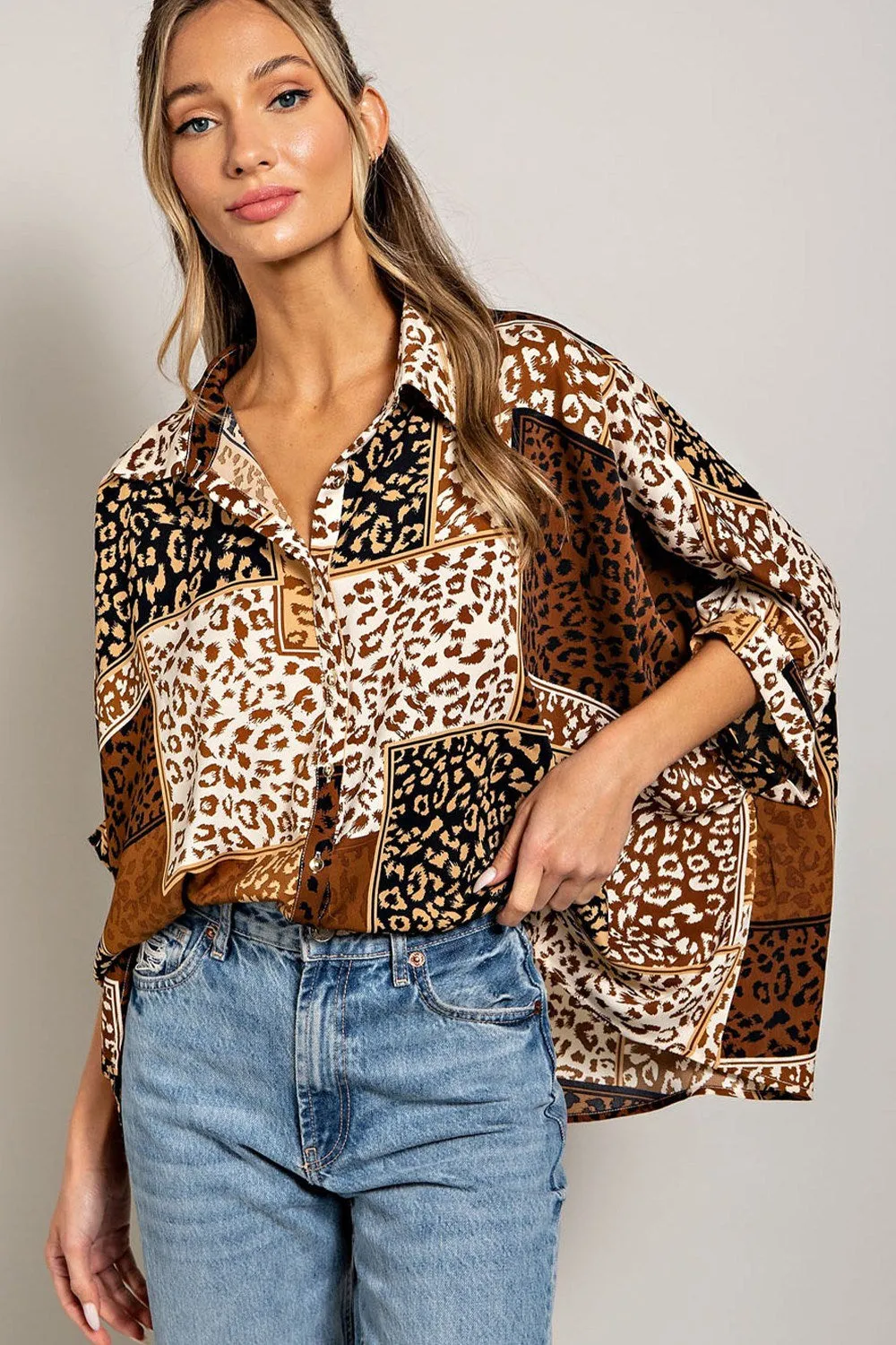 Mix animal print button down top with dolman sleeves