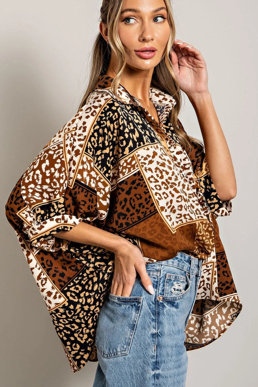 Mix animal print button down top with dolman sleeves