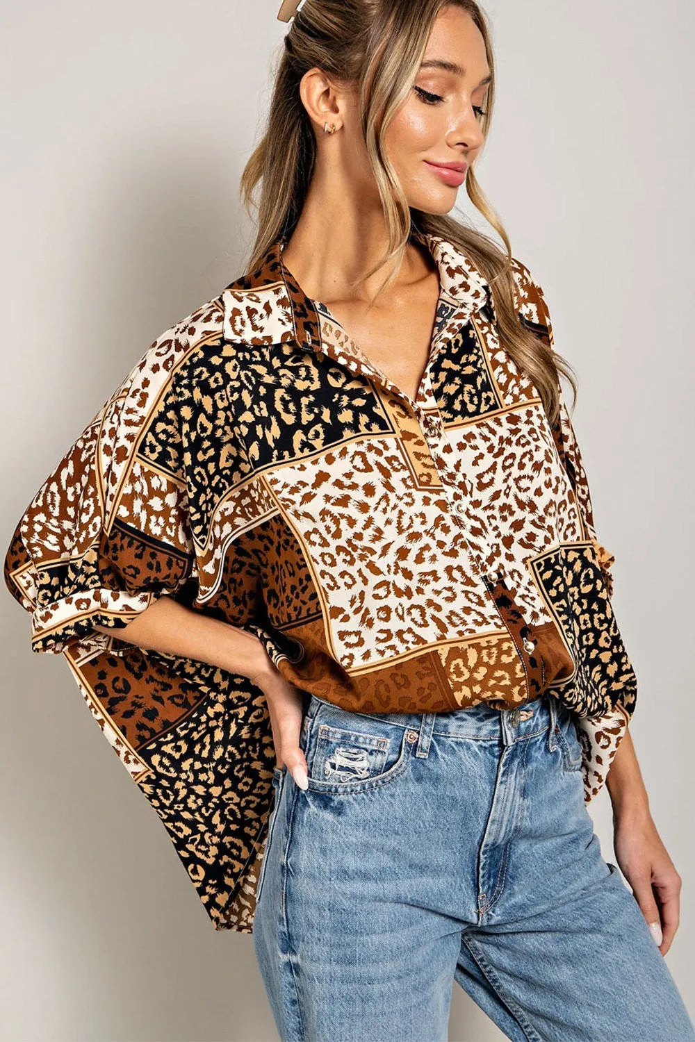 Mix animal print button down top with dolman sleeves