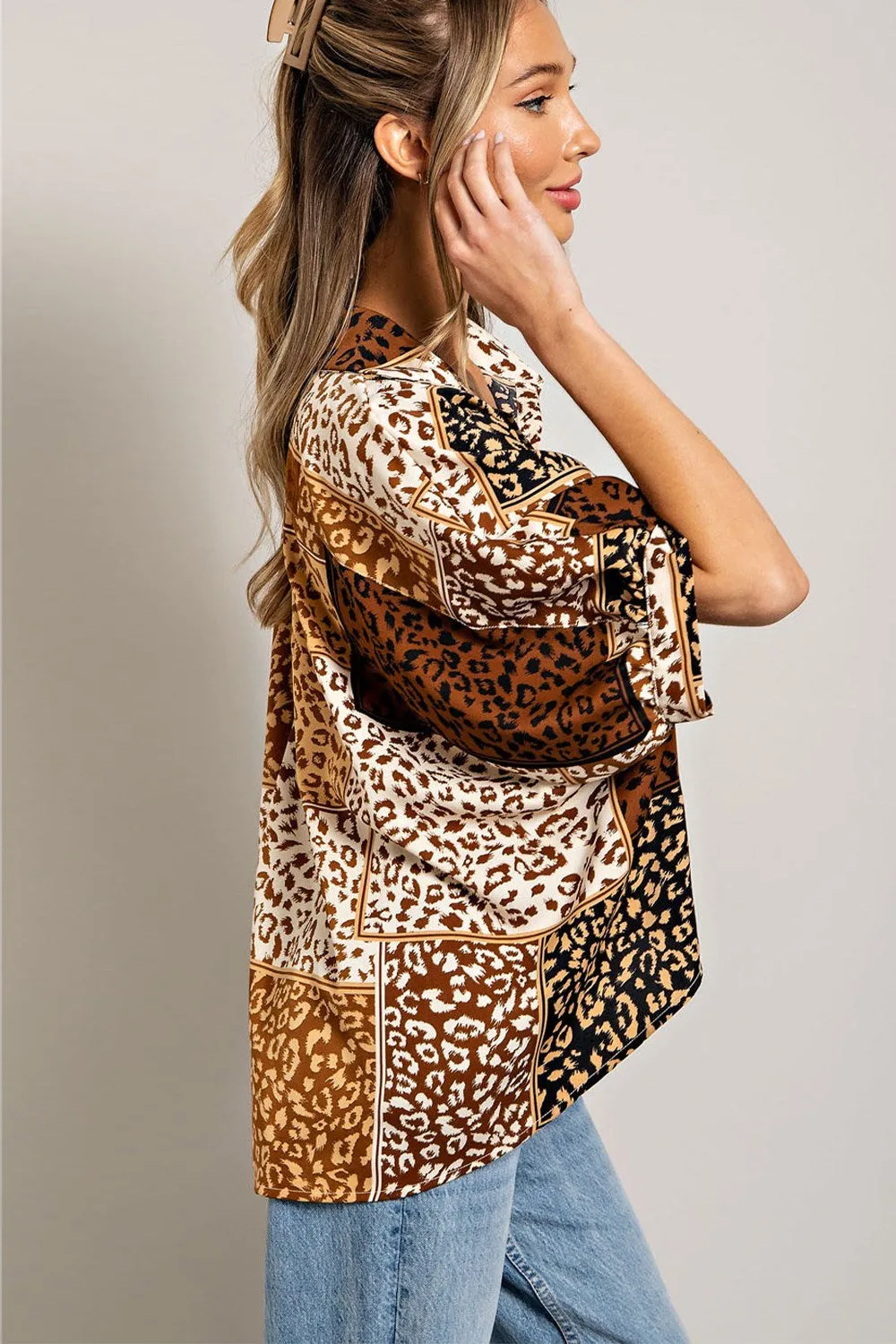 Mix animal print button down top with dolman sleeves